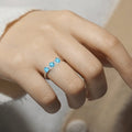 Three Stone Blue Topaz Ring by Fine Color Jewels
