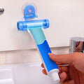 Toothpaste Squeezer Rolling Dispenser by DailySale