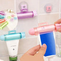 Toothpaste Squeezer Rolling Dispenser by DailySale