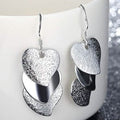 Triple Stacked Heart Earrings in White Gold by DailySale