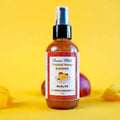 Tropical Mango Shimmer Body Oil by Duma Mbili LLC