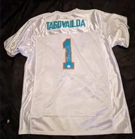 Tua Tagovailoa Miami Dolphins autographed jersey with COA by Price Is Right Miami