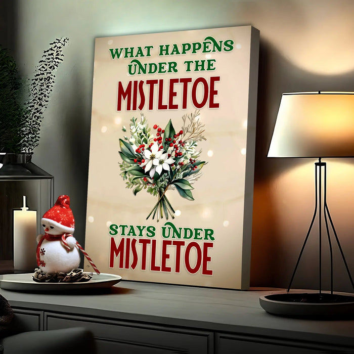 What Happens Under The Mistletoe Stays Under The Mistletoe Sign by Tailored Canvases
