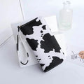 Women's Cute Versatile Faux Leather Cow Print Long Wallet by DailySale