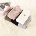 Women's Fuzzy Winter Socks by DailySale